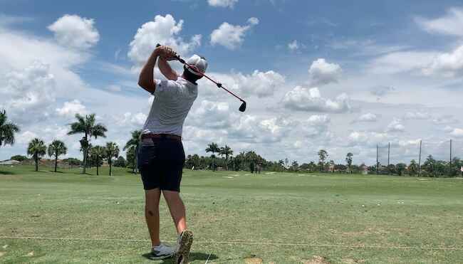 Golfer Working On Fixing A Slice With The Click Stick Training Aid Golfer Working On Fixing A Slice With The Click Stick Training Aid