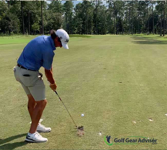 Michael VanDerLaan Hitting An Approach Shot With A Wedge Michael VanDerLaan Hitting An Approach Shot With A Wedge