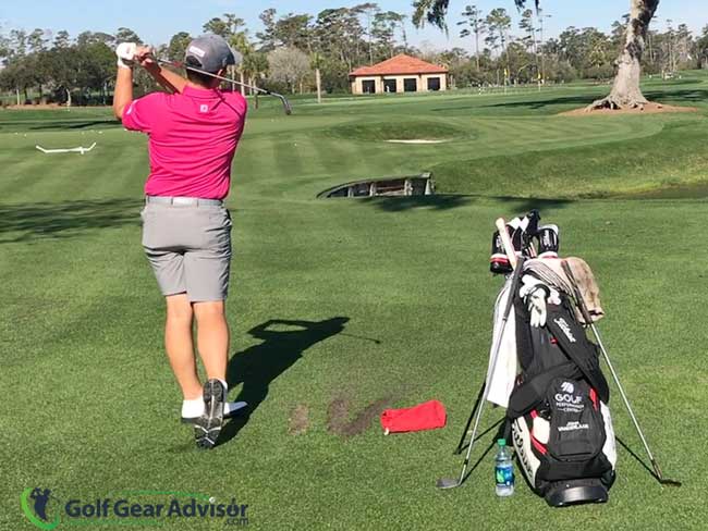 PGA Tour Player John VanDerLaan Comparing Titleist T100 and 620 CB Irons PGA Tour Player John VanDerLaan Comparing Titleist T100 and 620 CB Irons On The Back Of The Range At TPC Sawgrass