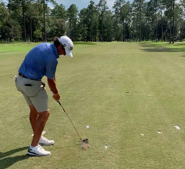 Staff Member Michael VanDerLaan Hitting A Forged Iron Staff Member Michael VanDerLaan Hitting A Forged Iron